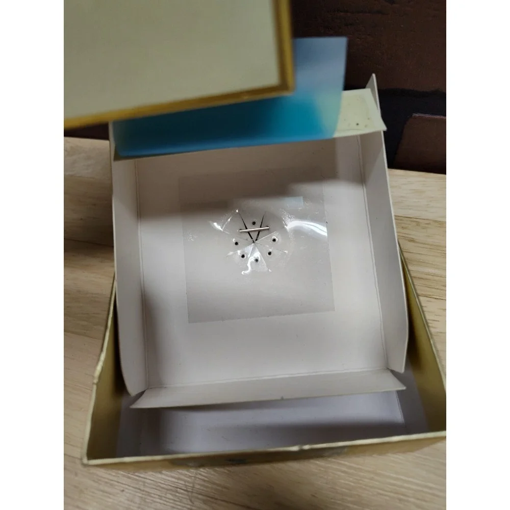Dana Buchman snowflake brooch pin sparkle shine bright fashion jewelry